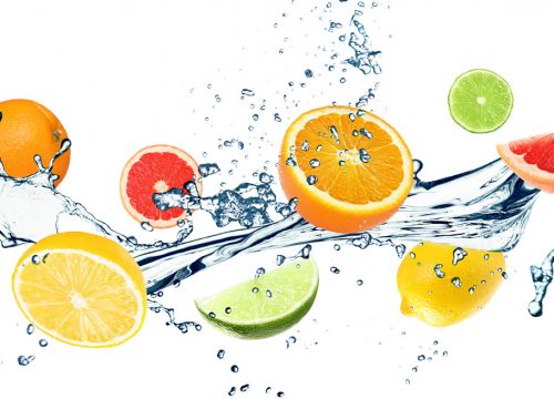 Photo of citrus fruits and water