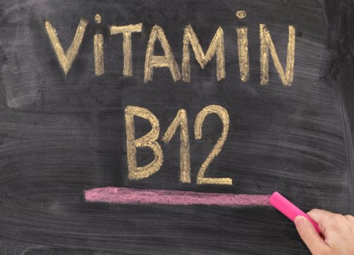 Vitamin B12 written on a chalkboard